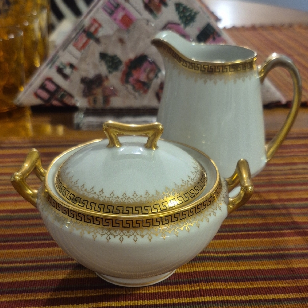 Limoges Gold and White Porcelain Sugar Bowl and Creamer